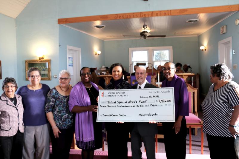 Miracle Angels of Israel United Methodist Church present a donation check for the Patient Special Needs Fund to Tunnell Cancer Center. Shown are (l-r) Carolyn A. Morris; Betty J. Streett; Sandra Neal; the Rev. Marjorie Belmont-Burns; Shorel Clark; Barry Hamp, executive director of Beebe Healthcare’s Tunnell Cancer Center; Joyce Rickards; and Lorie Hopkins. SUBMITTED PHOTO